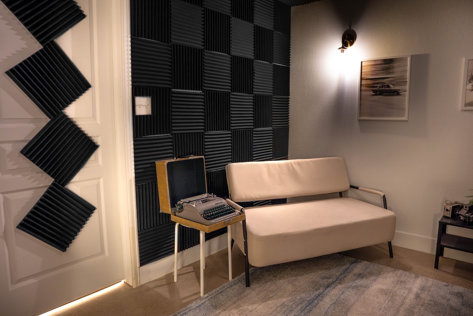 Podcast recording room with acoustic paneling